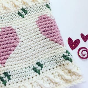 close up of crochet cowl with hearts