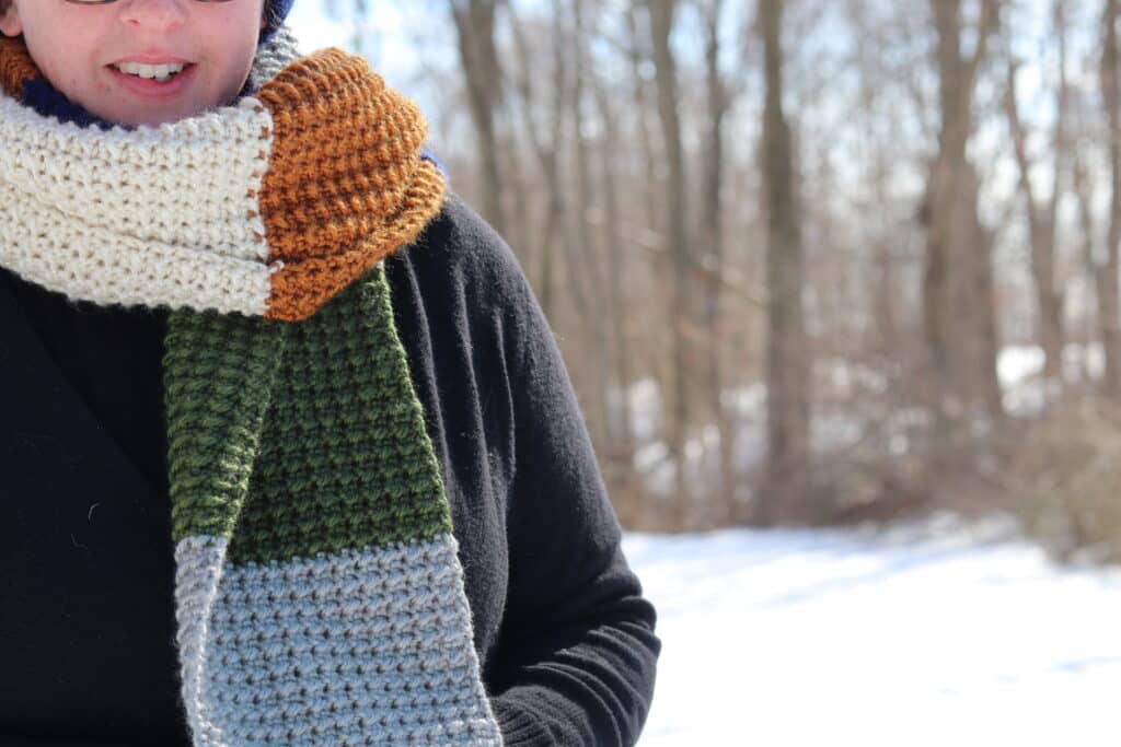 woman wearing the terra nova crochet scarf
