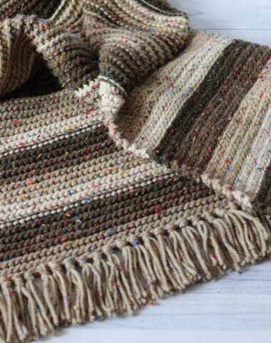 crochet blanket laying on flow
