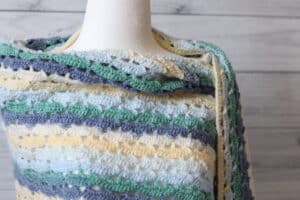 neck line of a light weight crochet shawl