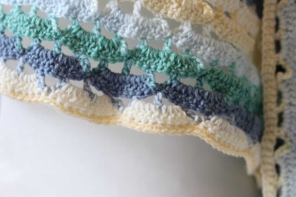 close up of the edging on a lacy crochet shawl