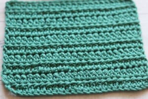 the Alternative Double Crochet Stitch worked in green yarn