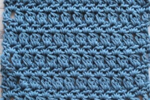 a swatch of the zigzag lozenge stitch in blue