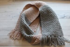 grey and pink textured crochet scarf
