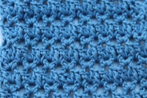natural wicker crochet stitch worked in blue yarn