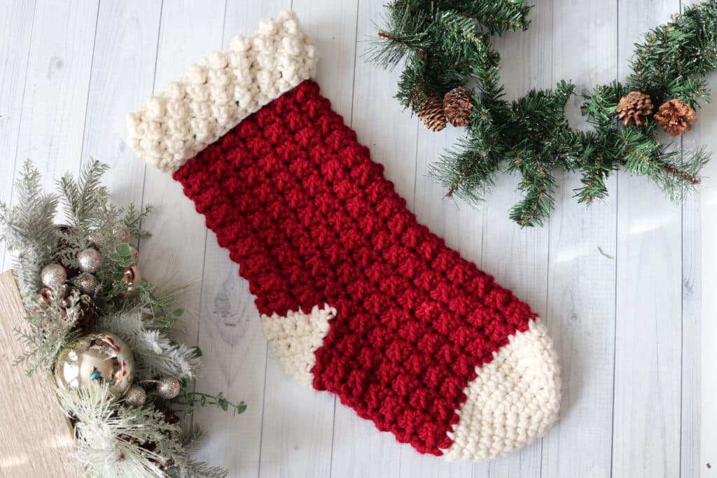 A red and white crochet Christmas stocking