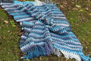 blue white and grey textured crochet blanket