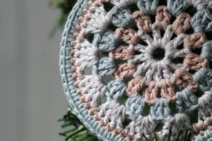 close up of a crochet granny circle Christmas Ornament