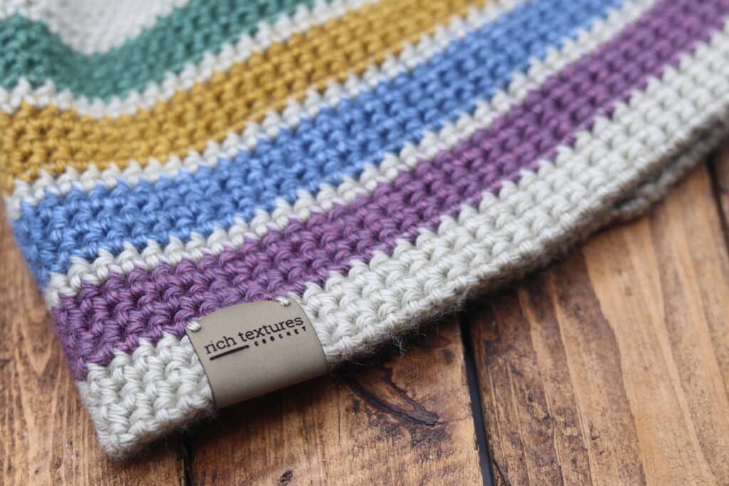 close up of the brim on a rainbow crochet beanie