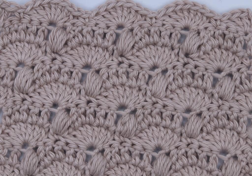 the fan and bobble crochet stitch worked in pink yarn