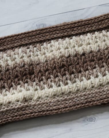 The Crochet Feathers Cowl in cream and taupe coloured yarn