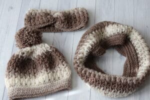 The Feathers Crochet Set including the beanie, ear warmer and cowl.