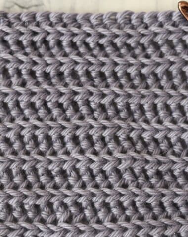 Yarn Over slip stitch crochet ribbing worked in grey yarn
