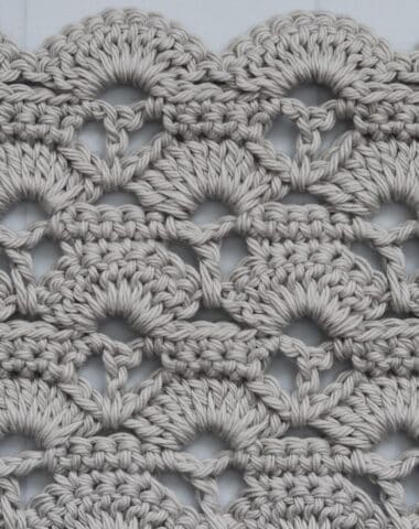 A beautiful shell crochet stitch pattern worked in grey yarn