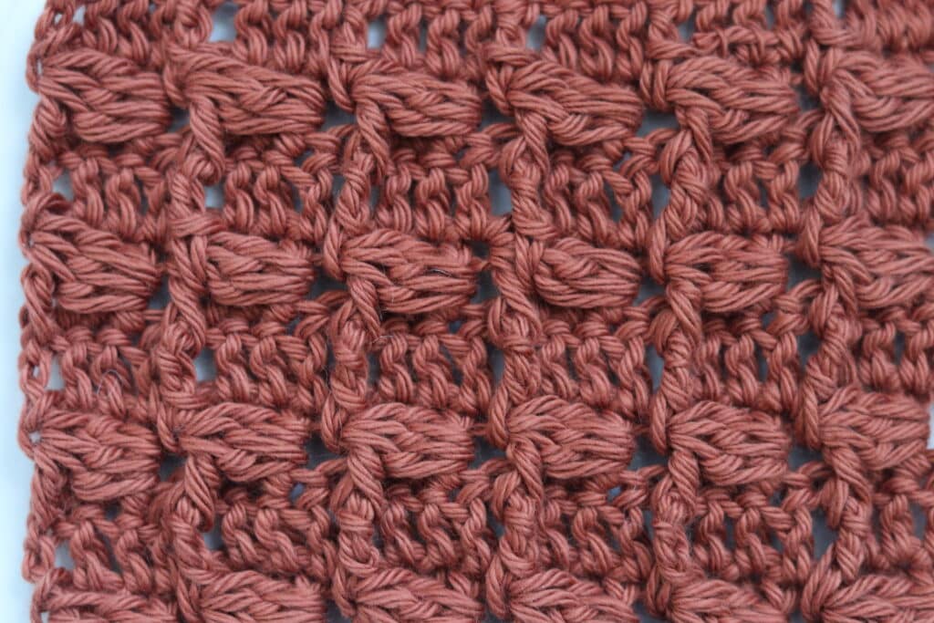The Crochet lazy cluster stitch worked in a bronze coloured yarn