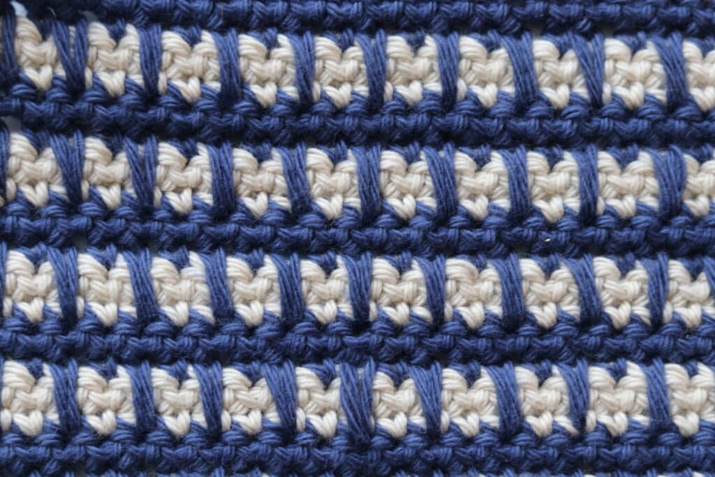 The Aligned Easy Crochet Spike Stitch worked in blue and grey yarn
