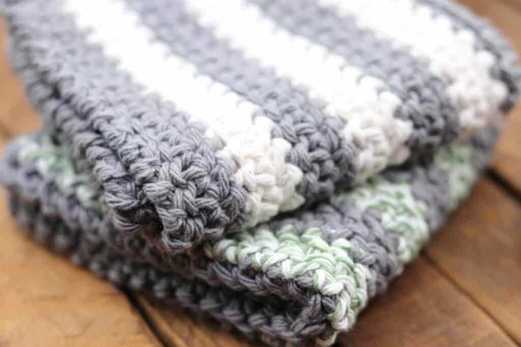 Crochet Washcloths worked in grey and white and green and white stripes