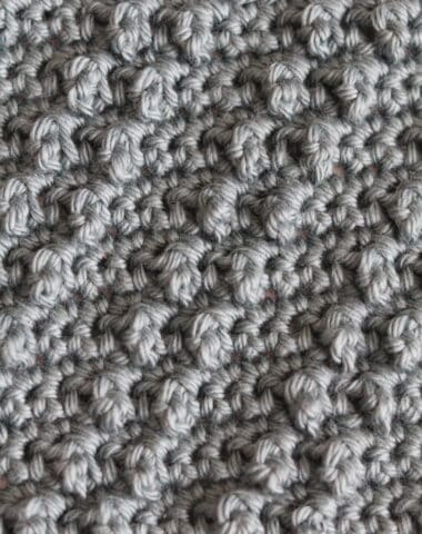 The crochet diagonal triple stitch worked in a grey yarn