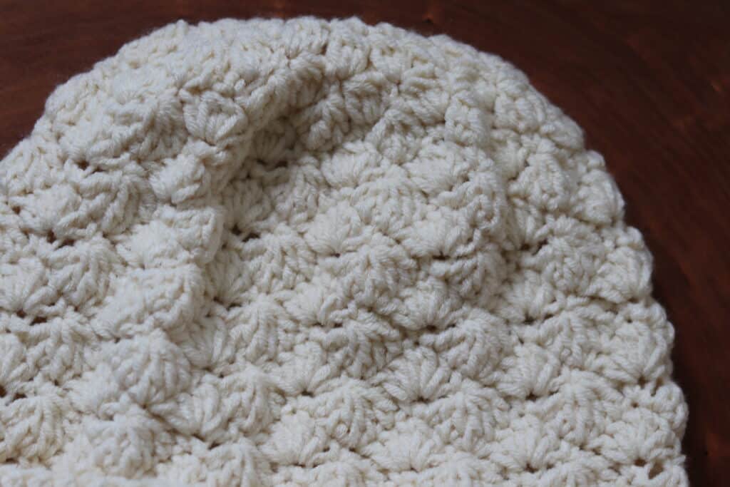 A close up of the top of the Crochet Brighton Beanie