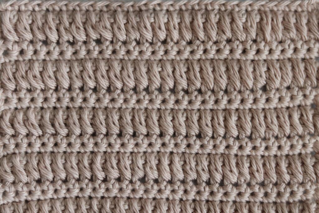 The crochet cone stitch worked in a tan coloured yarn