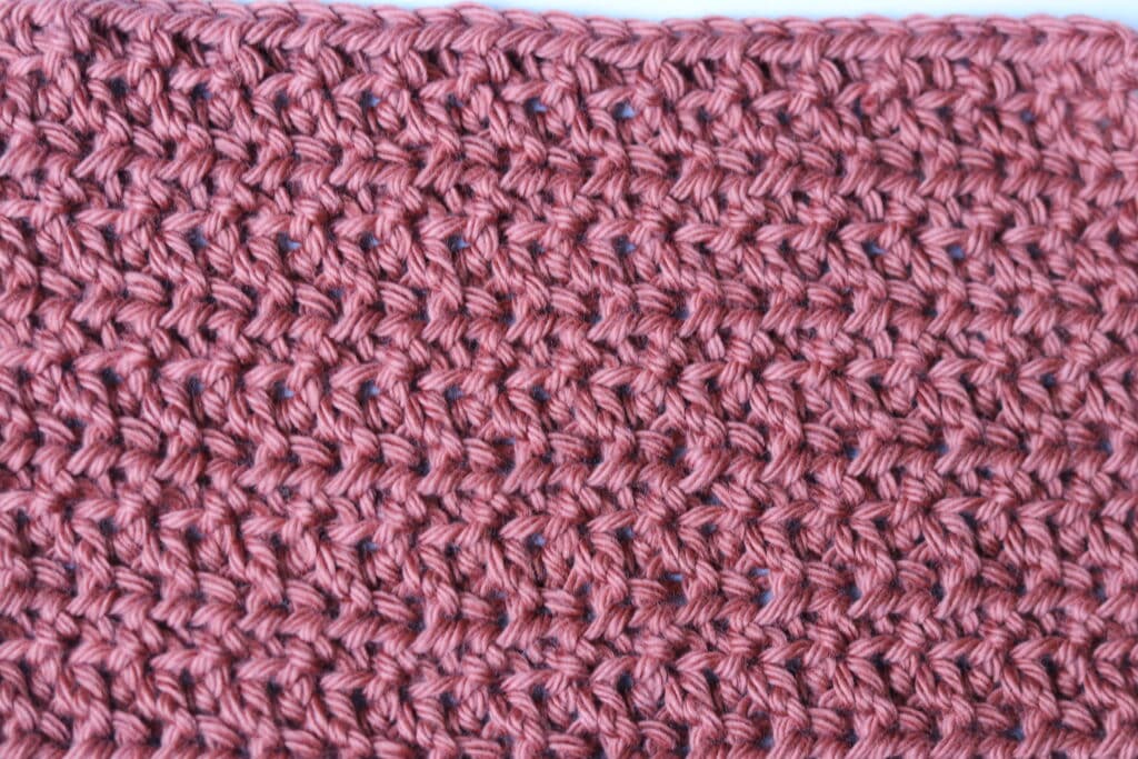 A subtly textured crochet stitch pattern featuring half double crochet stitches worked in the front and back loops