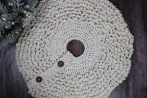 A birds eye view of a crochet Christmas tree skirt using a super bulky weight yarn