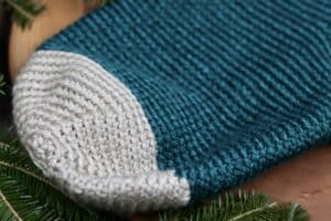 A close up of the toe on the crochet Wintertime Christmas Stocking