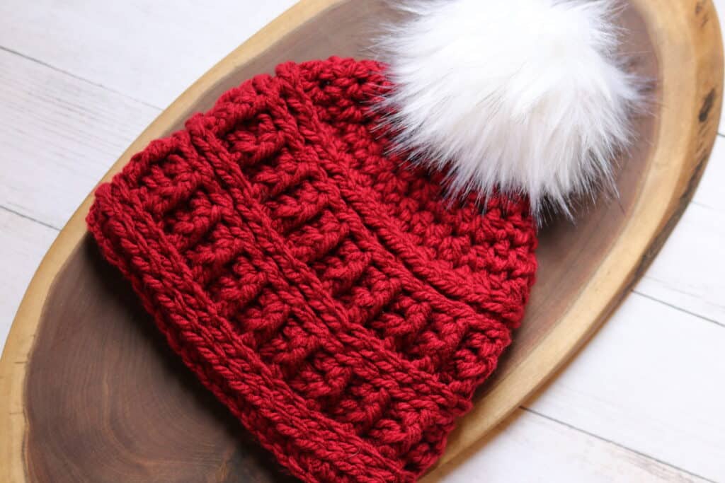 A textured Red crochet beanie made with a super bulky weight yarn