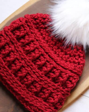 A textured Red crochet beanie made with a super bulky weight yarn