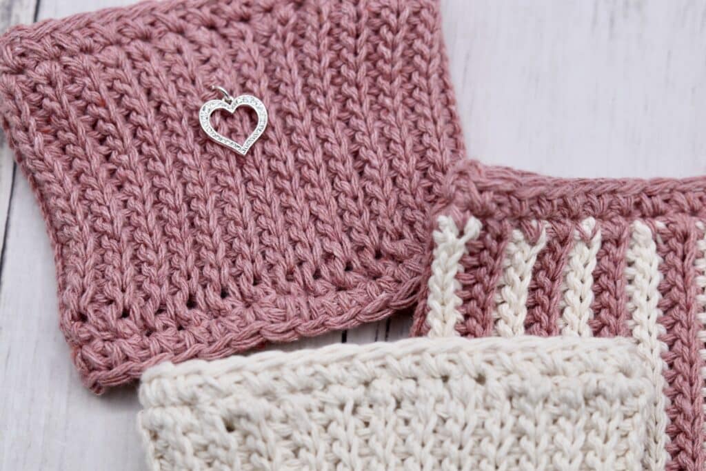 The crochet Hint of Love cup Cozy lying flat