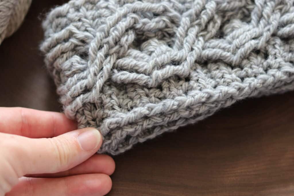 A close up of the stitches in the crochet Diamond Ear Warmer