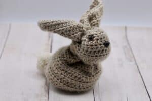 A tan coloured crochet bunny