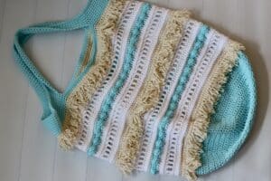 A textured crochet market bag