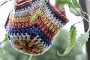 A close up of the bottom of the easy crochet plant hanger