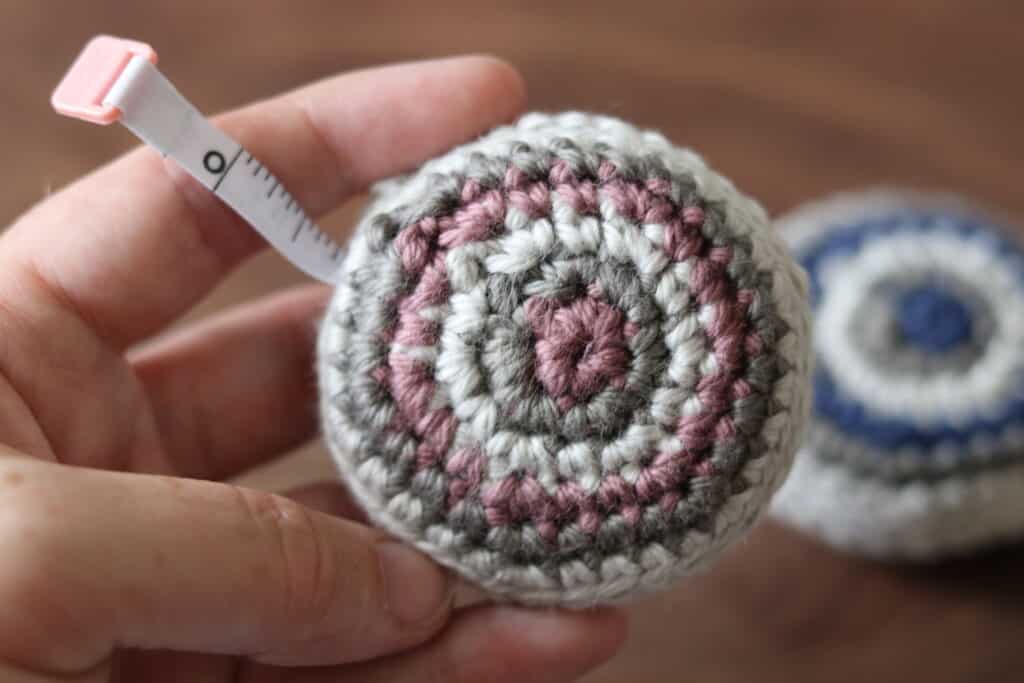 A close up of the front side of the Retro Crochet Measuring Tape Cover