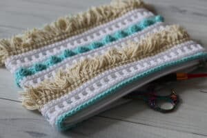 A close up of the crochet Summertime Accessory Pouch