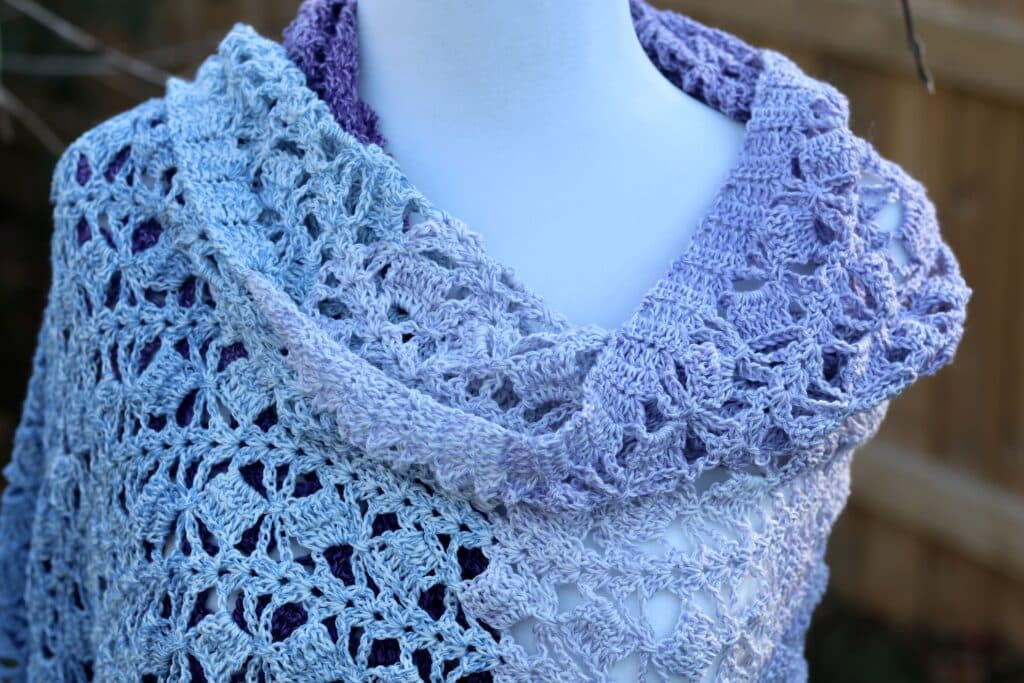 A close up of the stitches in the crochet Iris Shawl