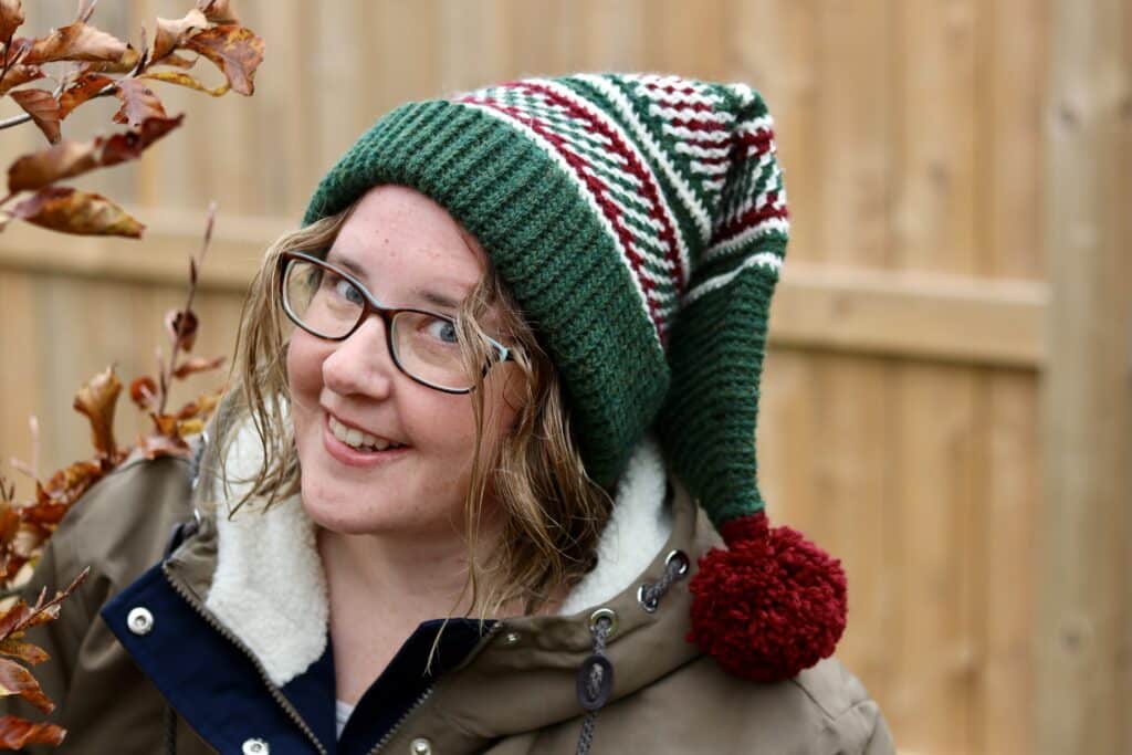 crochet classic elf hat worn by a woman