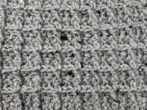 Example of crochet waffle stitch in grey tweed yarn