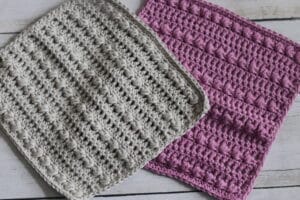 Crochet Dish Cloth one in pink yarn another in grey yarn