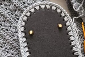 close up of a non crochet bag bottom to be added onto a crochet bag