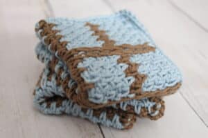 Set of crochet dishclOThs folded on a table