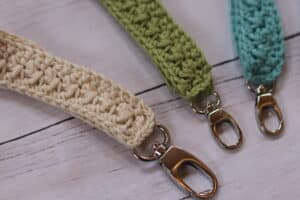 a close up of the clasps on the crochet Elizabeth Keychains