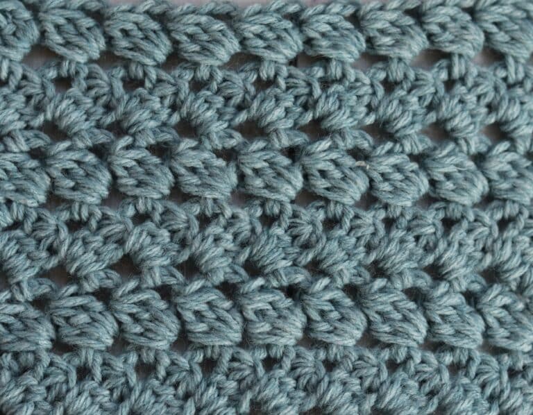 A swatch of the connected spiral stitch worked in blue yarn